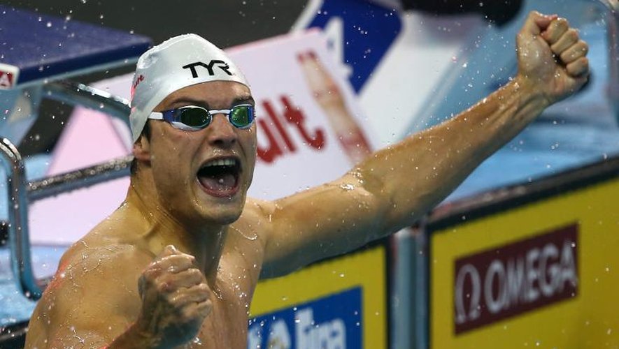 Le Français Florent Manaudou après son titre et son record du 50m nage libre, lors des Mondiaux en petit bassin de Doha, le 5 décembre 2014