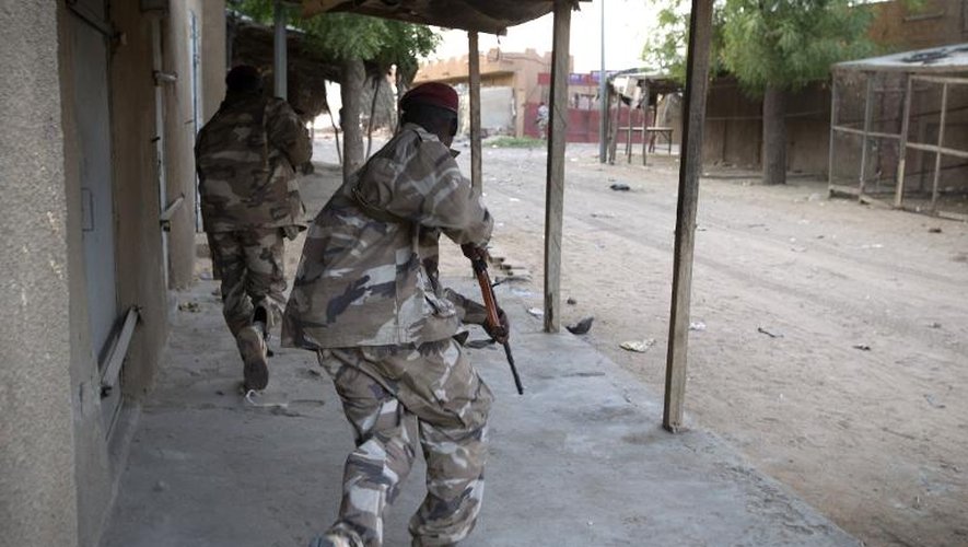 Des soldats maliens en action à Gao le 13 avril 2013