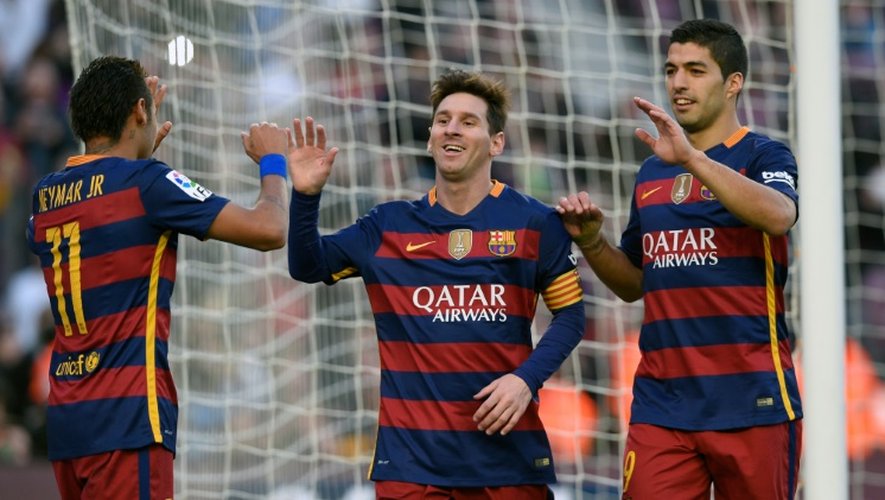 Neymar, Lionel Messi et Luis Suarez, après l'un des trois buts inscrits par l'Argentin face à Grenade, le 9 janvier 2016 au Camp Nou