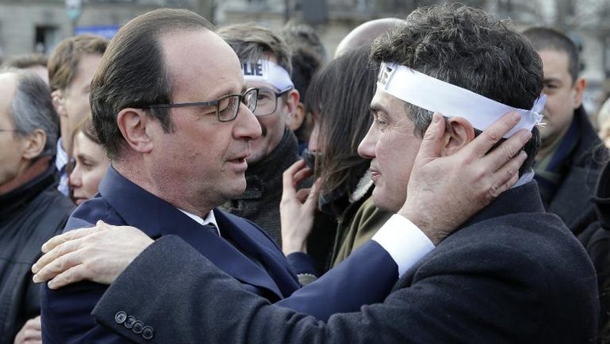 -François Hollande et le Dr Patrick Pelloux lors de la marche républicaine le 11 janvier 2015