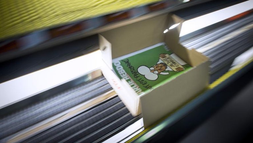 Le prochain numéro de Charlie Hebdo sous presse à Villabe près de Paris, le 13 janvier 2015