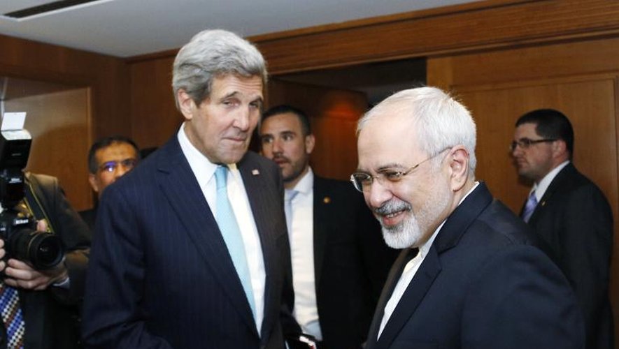 Le Secrétaire d'Etat américain John Kerry et le chef de la diplomatie iranienne Mohammad Javad Zarif à Genève, le 14 janvier 2015