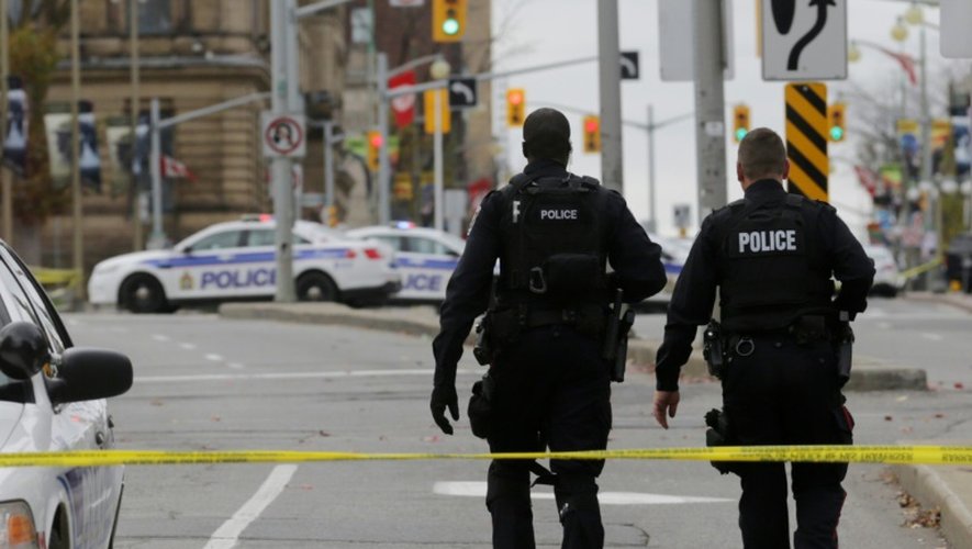 Des policiers le 22 octobre 2014 à Ottawa où un soldat a été tué près du Parlement