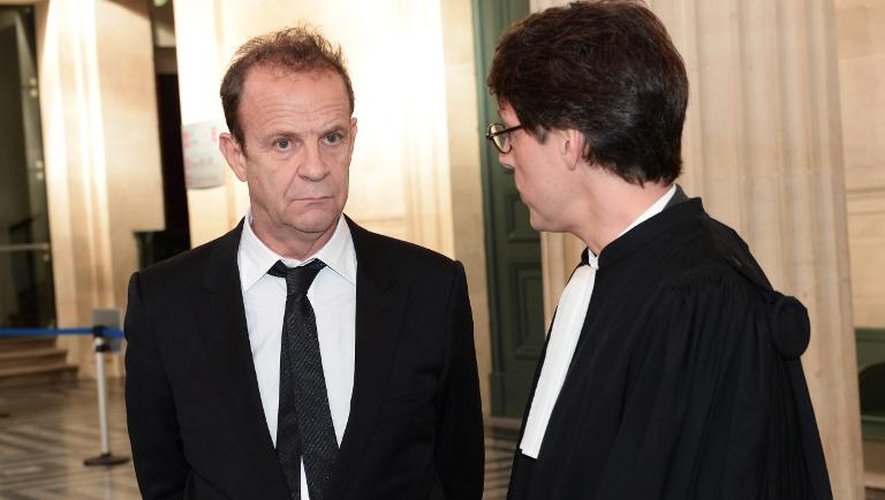 Le photographe Francois-Marie Banier et son avaocat Laurent Merlet au tribunal correctionnel de Bordeaux, le 2 février 2015