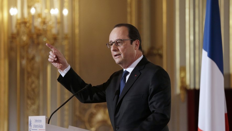 Francois Hollande répond aux questions à l'occasion de sa cinquième conférence de presse semestrielle jeudi à l'Elysée.