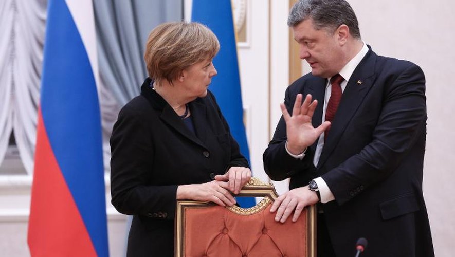 Agnela Merkel et le président ukrainien Petro Porochenko le 11 février 2015 à Minsk