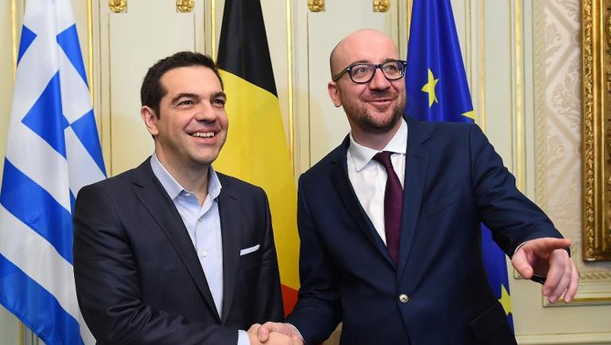 Le Premier ministre grec  Alexis Tsipras accueilli par son homologue belge Charles Michel à son arrivée le 12 février 2015 à Bruxelles