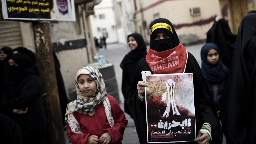 Une femme lors d'une manifestation marquant le 4ème anniversaire du soulèvement à Bilad al-Qadeem dans la banlieue de Manama, le 13 février 2015