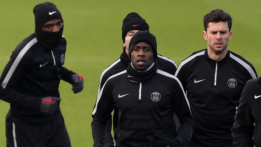 Les joueurs du PSG, dont Blaise Matuidi (c) et Thiago Motta (d) à l'entraînement le 16 février 2015 au Camp des Loges près de Paris