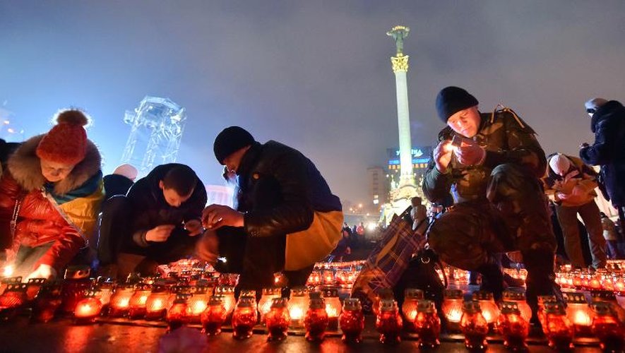 Des Ukrainiens célèbrent le 20 février 2015 le premier anniversaire des manifestations brutalement réprimées sur la place Maïdan, à Kiev