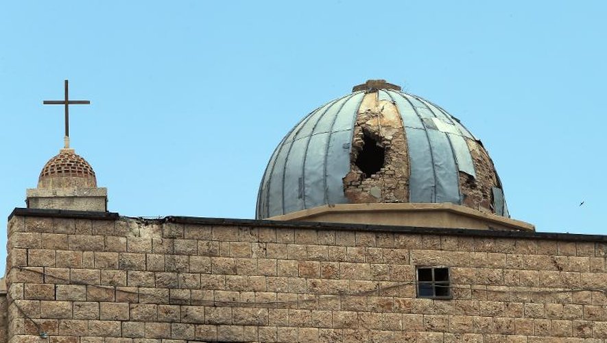 Une église endommagée dans une ville à majorité chrétienne de Syrie, à Maalula le 14 mai 2014