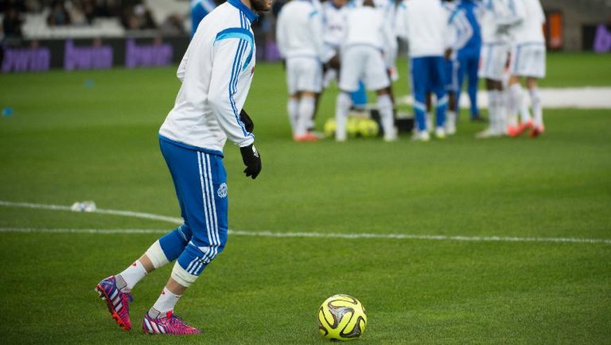 L'attaquant de de l'Olympique de Marseille André-Pierre Gignac s'entraîne en marge des titulaires contre Caen, le 27 février 2015 au stade Vélodrome