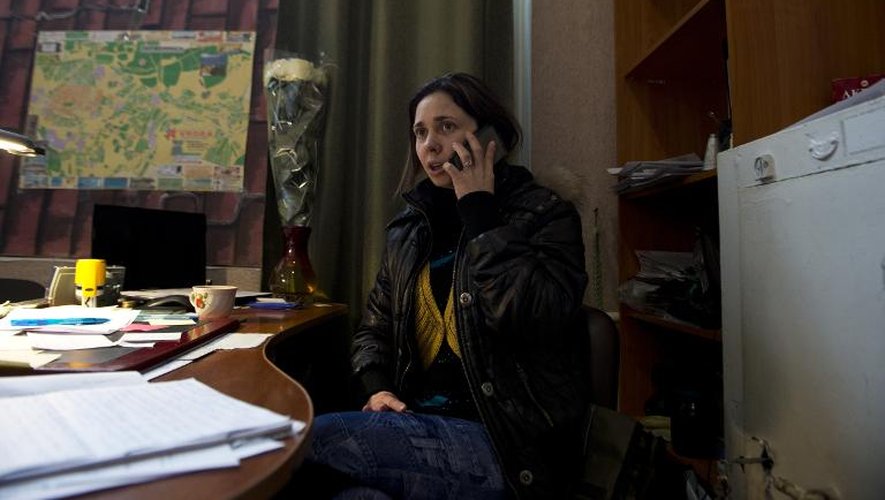 Olga Ivashenko a repris le flambeau de son mari, tué dans des circonstances troubles, à la tête de Pervomaïsk, une ville dévastée par les bombardements dans l'est de l'Ukraine, le 3 mars 2015