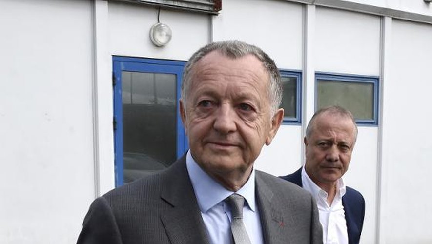 Le président de l'Olympique lyonnais Jean-Michel Aulas avec son conseiller spécial Bernard Lacombe, le 13 mai 2014 à Lyon