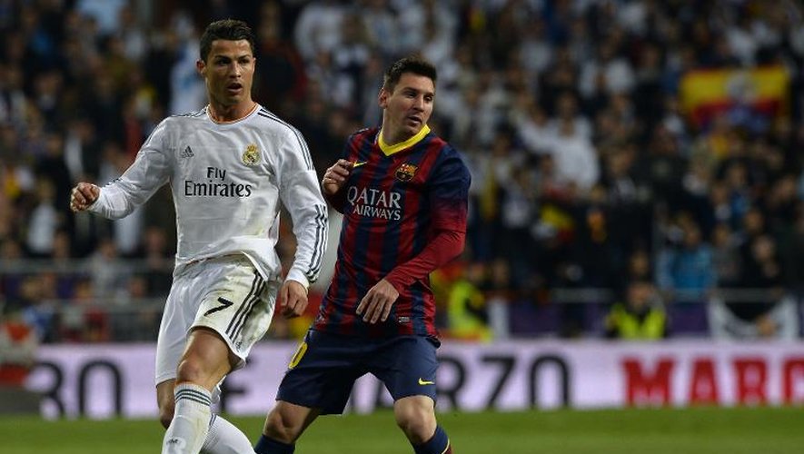 Les deux stars du football espagnol Cristiano Ronaldo et Lionel Messi, opposés dans le clasico Real Madrid-FC Barcelone, le 23 mars 2014 à Madrid