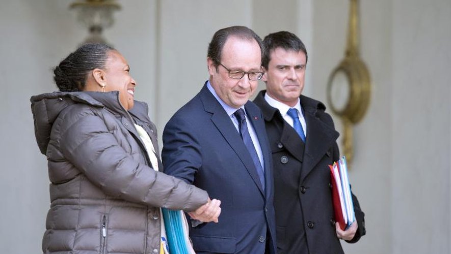 Christiane Taubira, François Hollande et Manuel Valls à l'Elysée à l'issue du Conseil des ministres le 11 mars 2015 à Paris