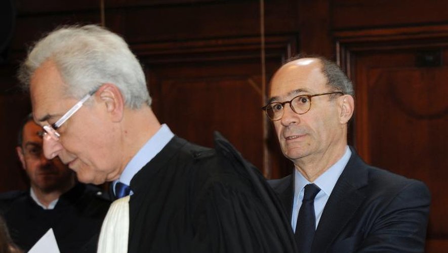Eric Woerth et son avocat Jean Yves Le borgne à leur arrivée le 23 mars 2015 au tribunal à Bordeaux