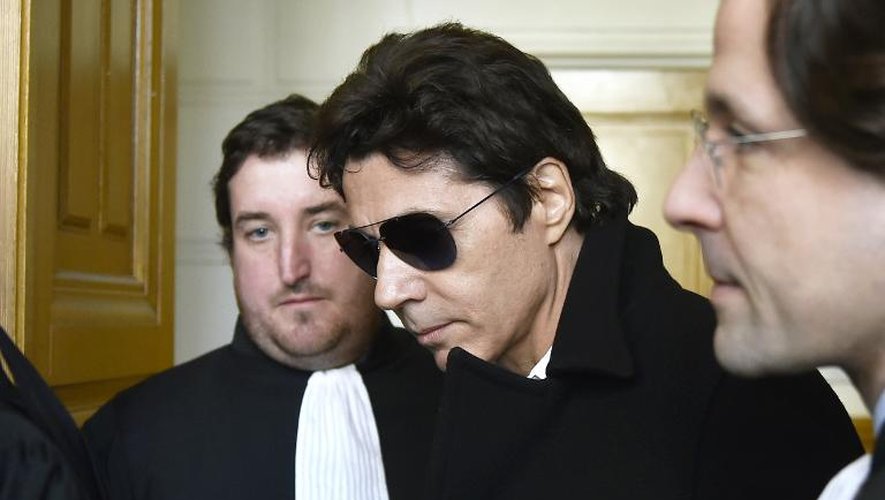 Le chanteur Jean-Luc Lahaye arrive au Palais de justice de Paris, le 23 mars 2015