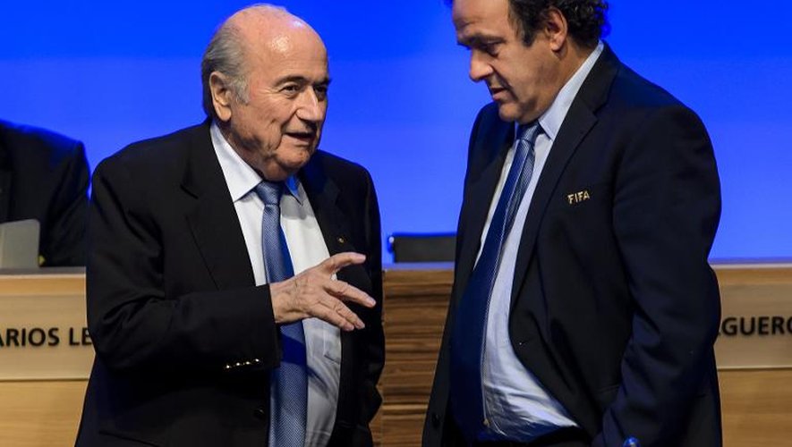 Les présidents de la Fifa Joseph Blatter et de l'UEFA Michel Platini, le 11 juin 2014 à Sao Paulo