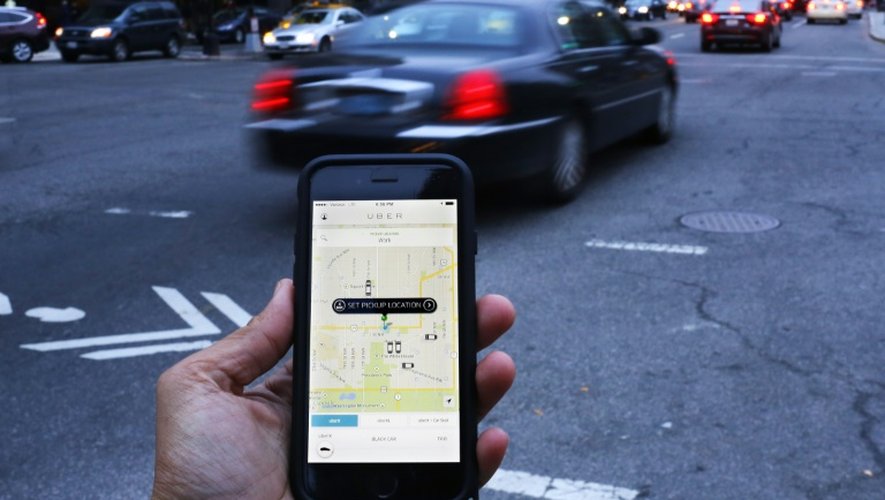 L'application Uber sur un smartphone le 25 mars 2015 à Washington