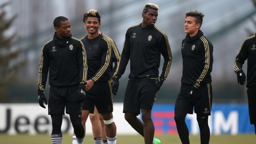 Les joueurs de la Juventus Patrice Evra, Mario Lemina, Paul Pogba et Paulo Dybala, à l'entraînement le 22 février 2016 à Vinovo
