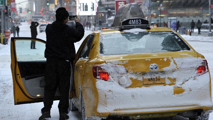 Un chauffeur de taxi à Times Square, à New York, le 3 janvier 2013