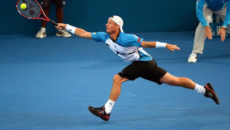 L'Australien Lleyton Hewitt opposé au Suisse Roger Federer en finale du tournoi de tennis de Brisbane le 5 janvier 2014