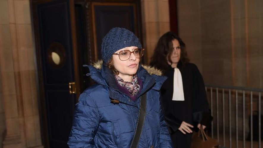 Marguerite Vignat, la fille de Arlette Ricci héritière de la maison de couture Nina Ricci, quitte le tribunal de Paris le 16 février 2015