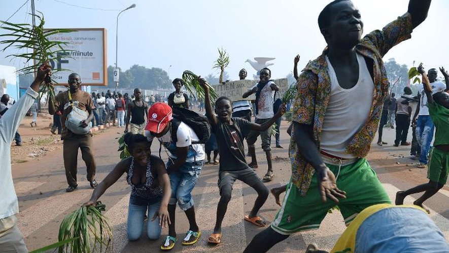 Des manifestants opposés aux Séléka demandent la démission du président centrafricain Michel Djotodia, le 10 janvier 2014 à Bangui