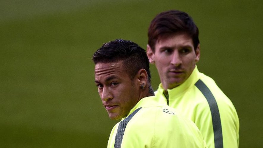 Les Barcelonais Messi et Neymar à l'entraînement au Parc des Princes, à Paris, le 14 avril 2015