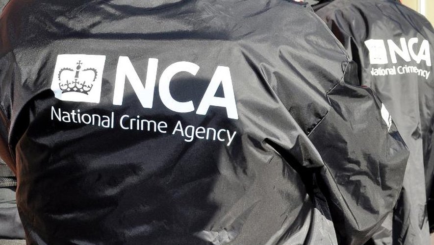 Des membres de l'Agence nationale du crime britannique à Londres