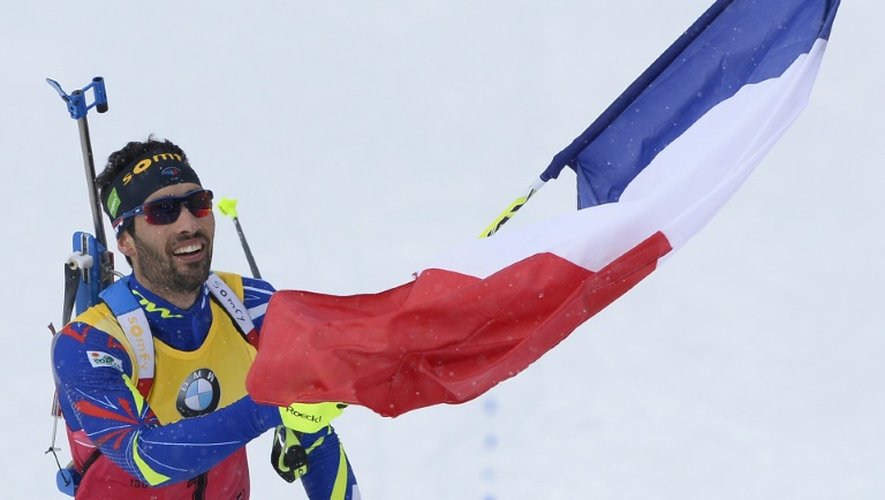 Le biathlète français Martin Fourcade sacré champion du monde de poursuite à Oslo et vainqueur du classement général de la Coupe du monde, le 6 mars 2016