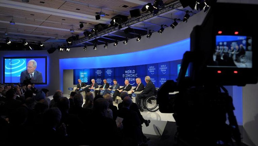 Le ministre allemand des Finances Wolfgang Schaüble (sur un écran) lors d'un débat le 25 janvier 2014 au dernier jour du forum de Davos