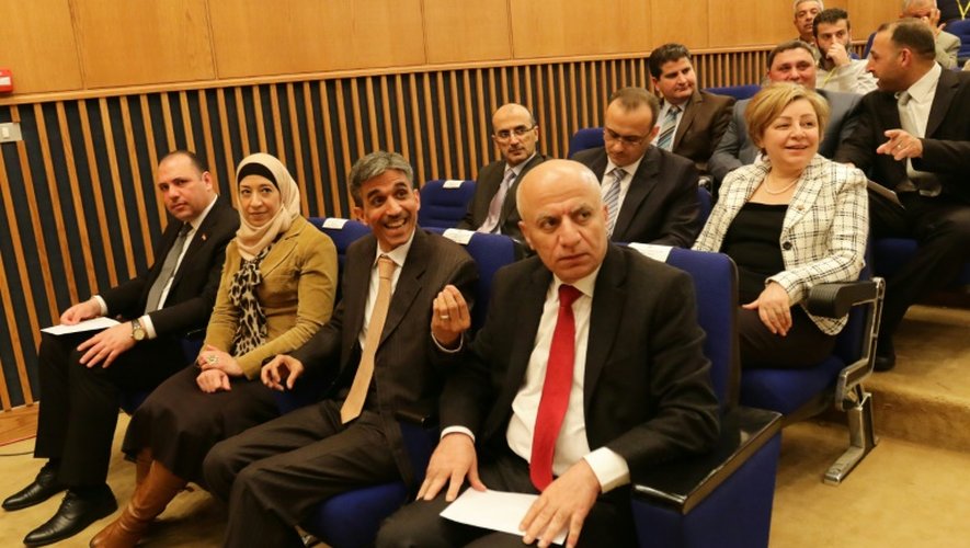 Des membres de la délégation des représentants du gouvernement syrien, le 12 mars 2016 à Damas