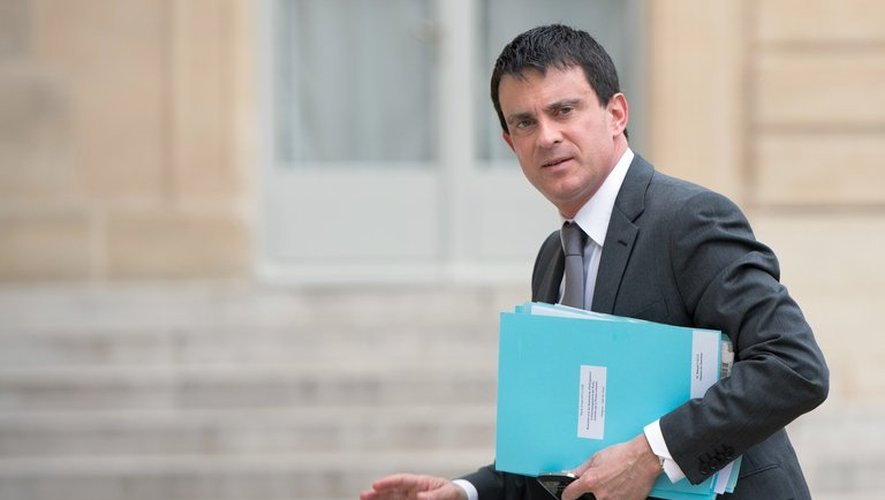 Le ministre de l'intérieur, Manuel Valls arrive à l'Elysée, le 14 mai 2013