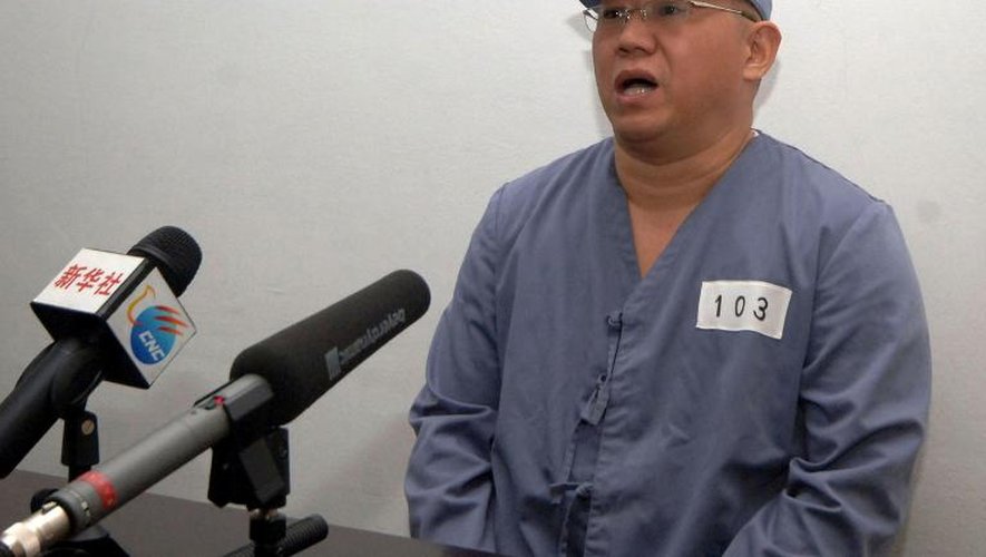 Photo prise le 20 janvier 2014 par l'agence officielle nord-coréenne Kcna de l'Américain Benneth Bae, condamné à quinze ans d'internement pour avoir tenté de "renverser" le régime de Pyongyang, lors d'une interview par la presse locale e