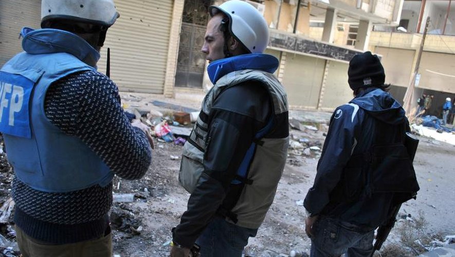 Syrie: au moins 65 civils évacués de Homs sous les tirs