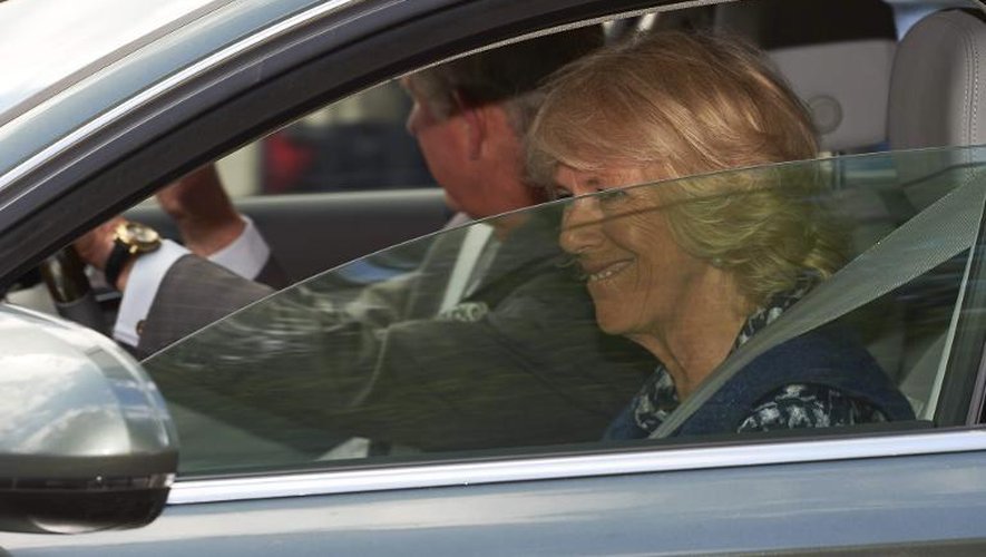 Le Prince Charles et son épouse Camilla quittent Kensington Palace le 3 mai 2015 où ils ont rendu visite à Kate et William