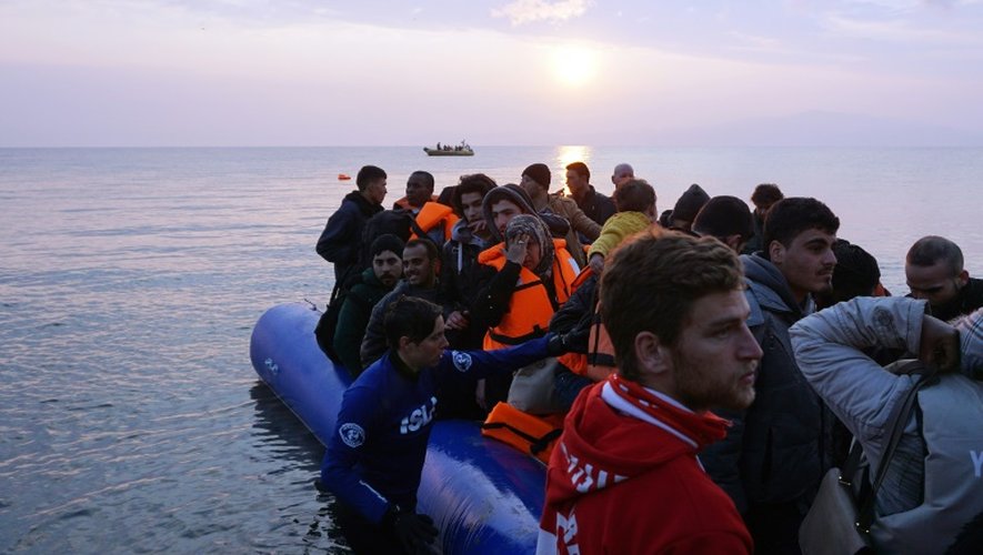 Des migrants arrivent le 20 mars 2016 sur l'île de Lesbos