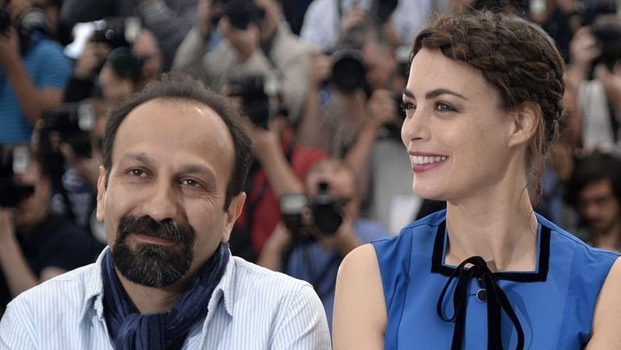 Asghar Farhadi (g) et Bérénice Béjo, le 17 mai 2013, au Festival de Cannes pour la présentation du film "Le Passé"