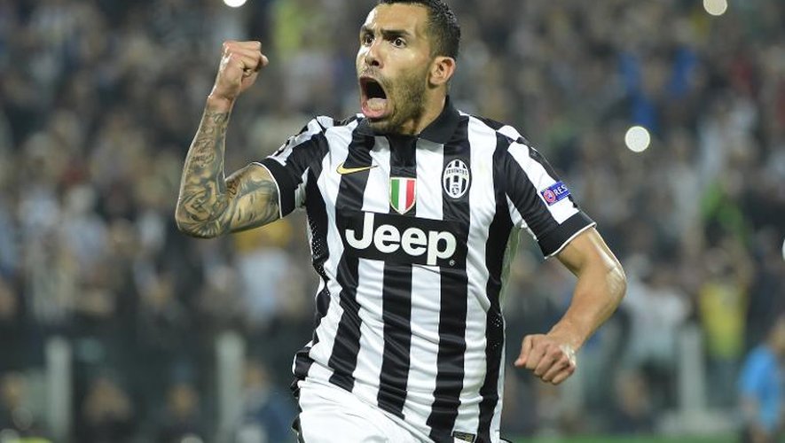 L'attaquant de la Juventus Carlos Tevez exulte après avoir transformé un penalty face au Real, le 5 mai 2015 au Juventus Stadium à Turin