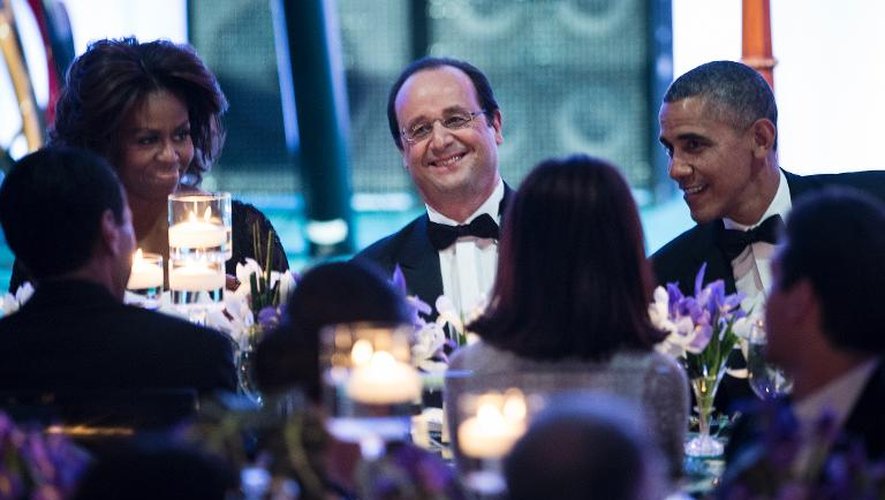 Michelle Obama, François Hollande et Barack Obama lors du dîner d'Etat à la Maison Blanche, le 11 février 2014 à Washington