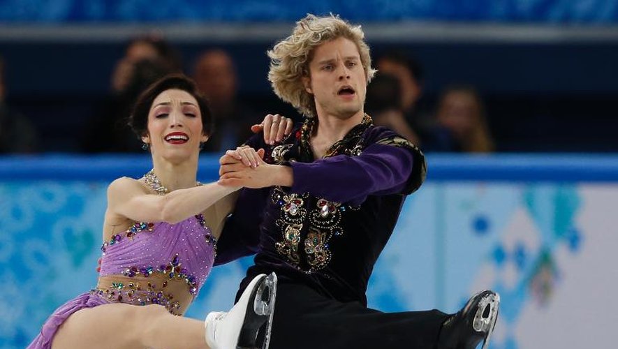 Le couple américain Meryl Davis-Charlie White exécute un concourt de l'épreuve de danse sur glace en patinage artistique, le 17 février 2014 au Palais des Glaces à Sotchi