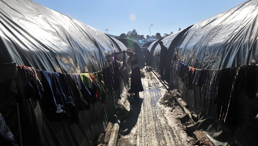 Des réfugiés syriens le 18 mars 2013 dans le camp Bab al-Hawa à la frontière entre la Syrie et la Turquie