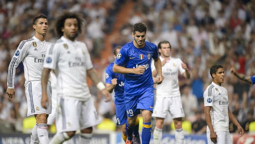 L'attaquant de la Juventus Alvaro Morata (c), buteur face au Real Madrid en demi-finale retour de la Ligue des champions, le 13 mai 2015 à Madrid