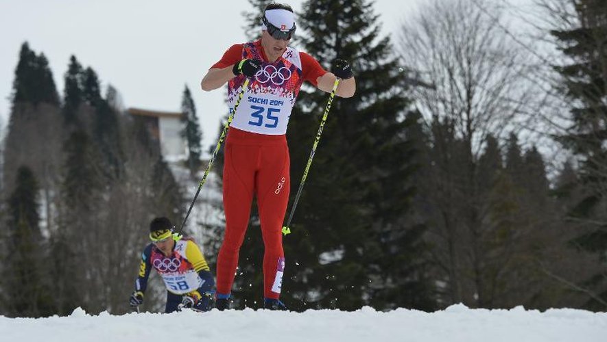 Le Suisse Dario Cologna, lors du 15 km de ski de fond, le 14 février 2014 à Sotchi