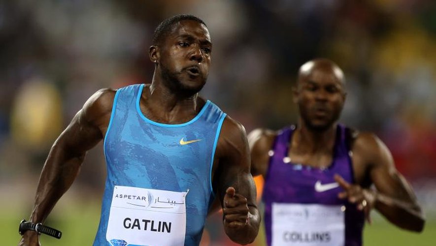 L'Américain Justin Gatlin (g), vainqueur du 100 m à Doha, étape de la Ligue de Diamant, le 15 mai 2015