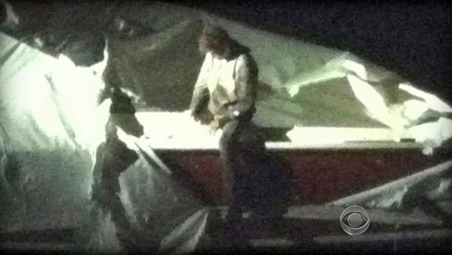 Capture d'écran de CBS News en date du 19 avril 2013 CBS, montrant Djokhar Tsarnaev, se cachant pendant sa fuite dans un bateau à Boston