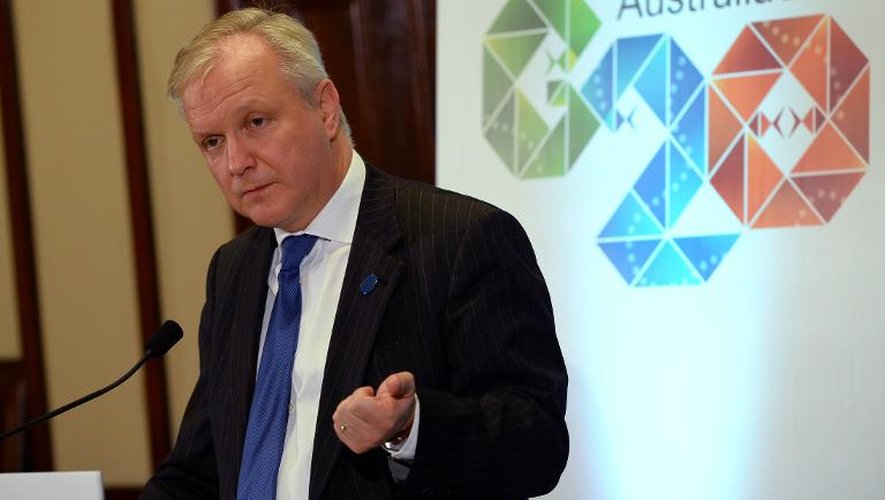 Le commissaire européen aux Affaires économiques, Olli Rehn, lors d'une conférence de presse le 23 février 2014 à Sydney