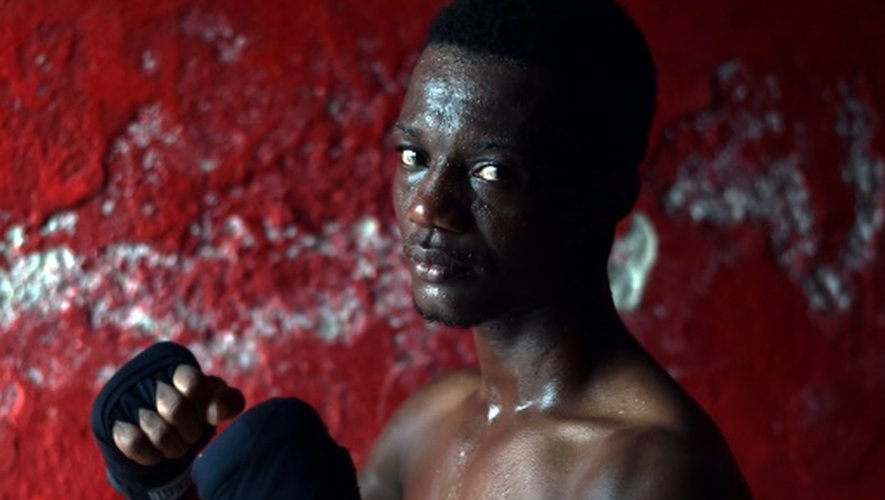 Djaul, boxeur amateur haitien, dans la petite salle d'entraînement à Cité Soleil, le 22 mars 2016